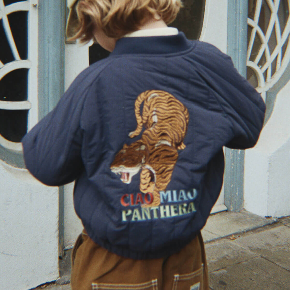 Blouson bomber enfant en nylon bleu marine imprimé tigre avec rembourrage en polyester et fermeture éclair