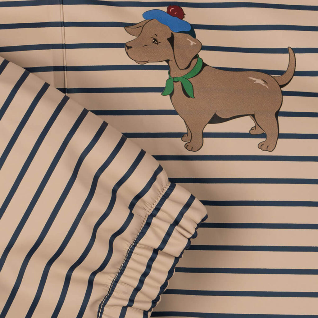 Veste de pluie en PU imperméable à rayures marines avec imprimé chien, capuche détachable et coutures thermosoudées pour le quotidien des enfants