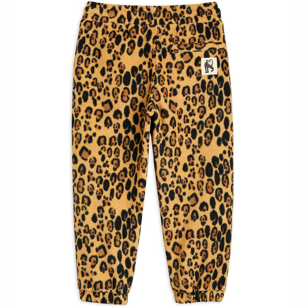 Pantalon en molleton recyclé à imprimé léopard beige avec poches latérales et taille élastique pour enfants, à porter en toute saison
