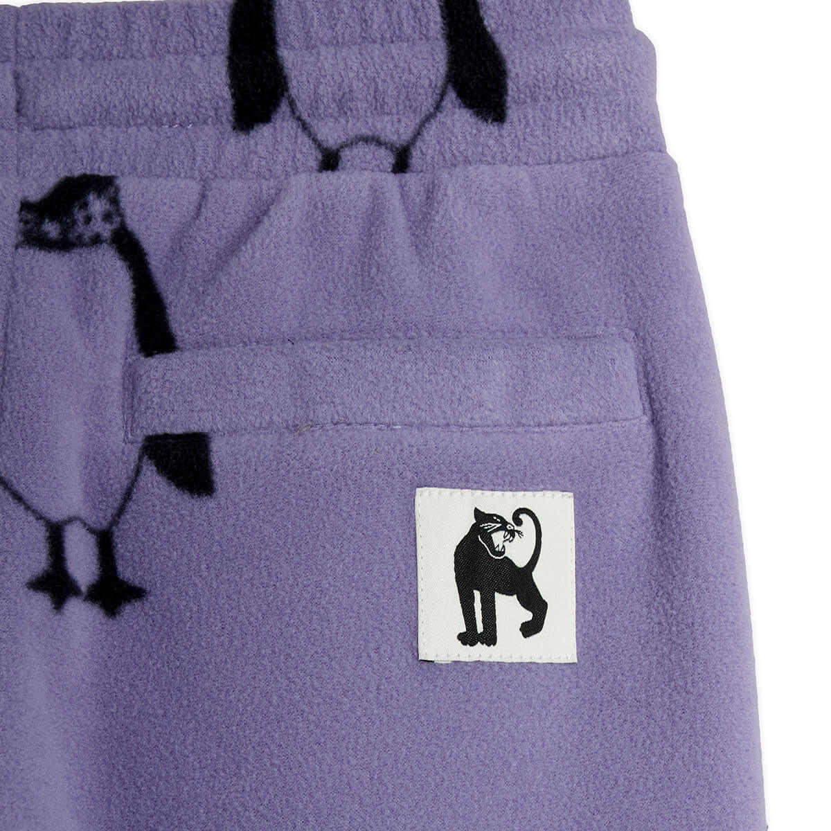 Pantalon en polaire recyclée à imprimé pingouin violet avec cordon de serrage à la taille pour enfants
