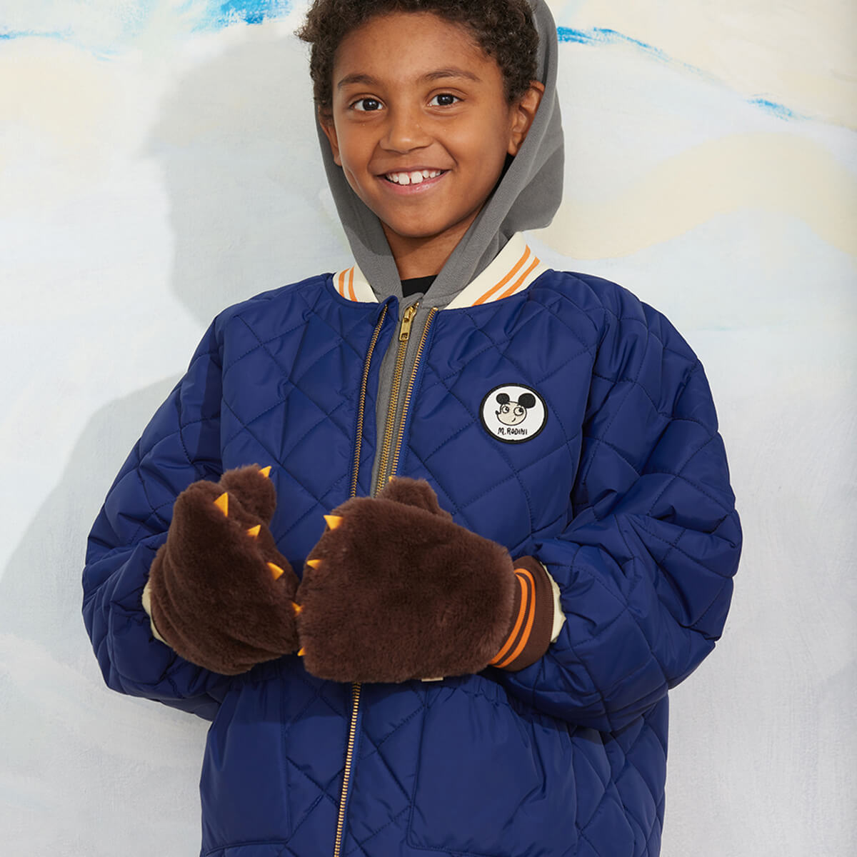 Doudoune matelassée en polyester recyclé à imprimé patchwork bleu avec poignets côtelés pour enfants au quotidien