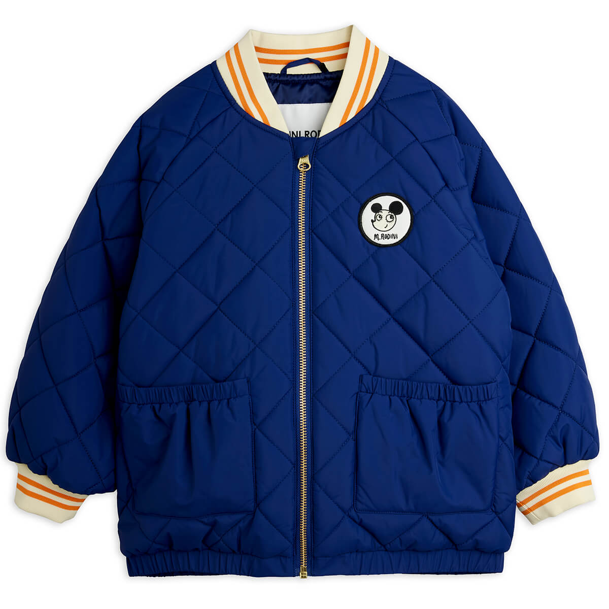 Doudoune matelassée en polyester recyclé à imprimé patchwork bleu avec poignets côtelés pour enfants au quotidien